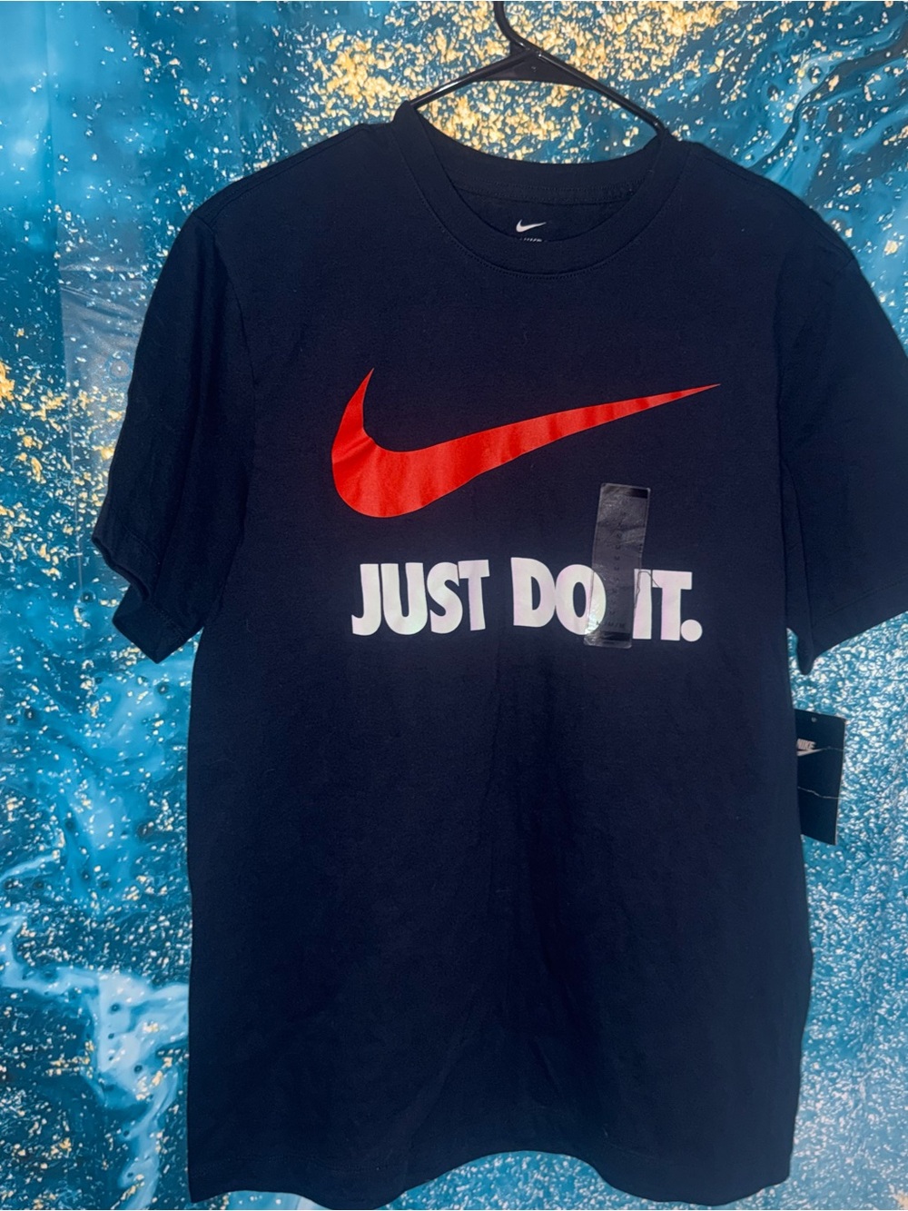 Nike Black Short-Sleeve Tee with Red Swoosh and White Text
